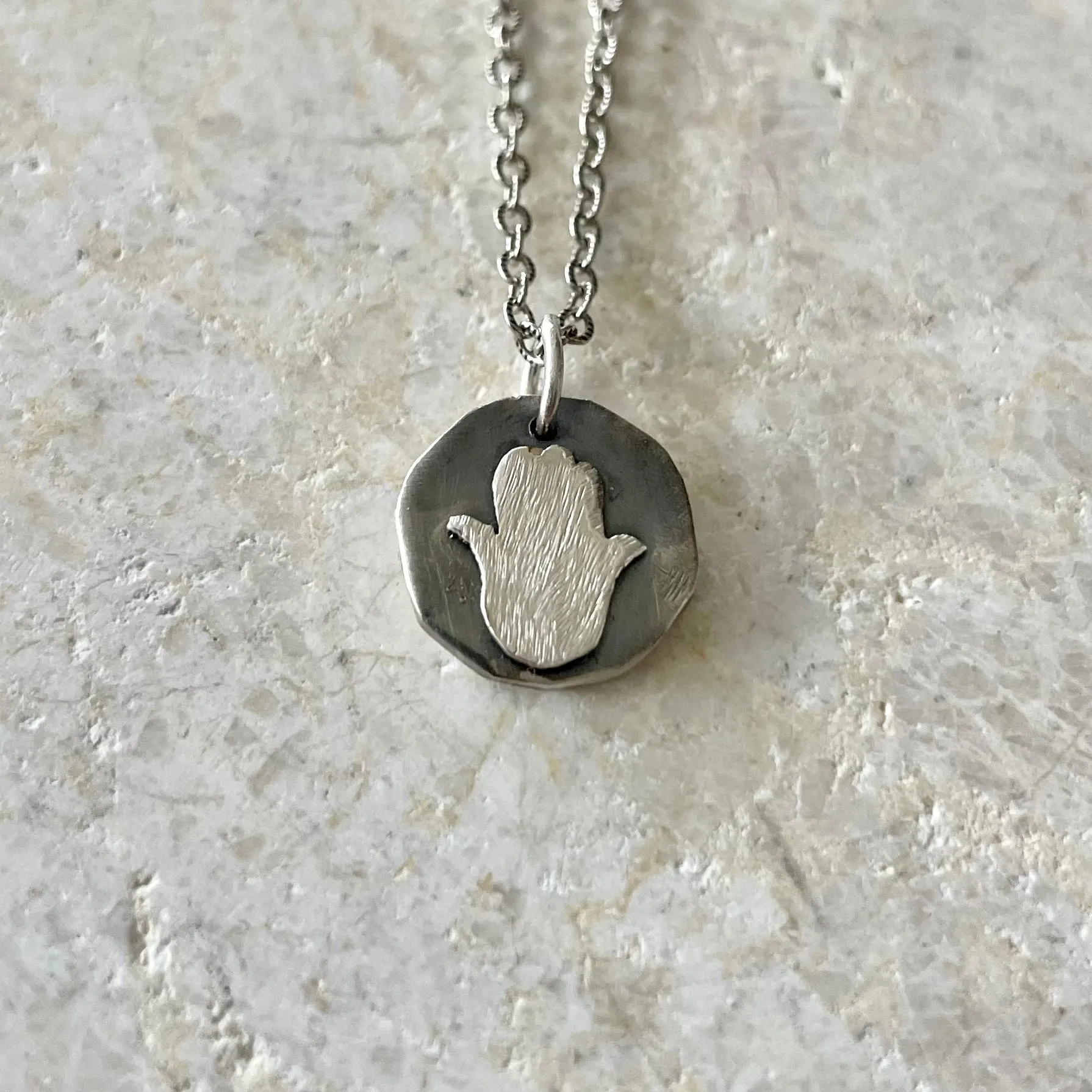 N46- Tiny Talisman Sterling Hamsa